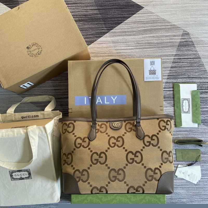 G*u*i shopping bags